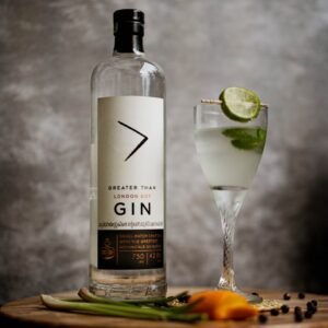 a bottle of wine and a glass of wine on a table